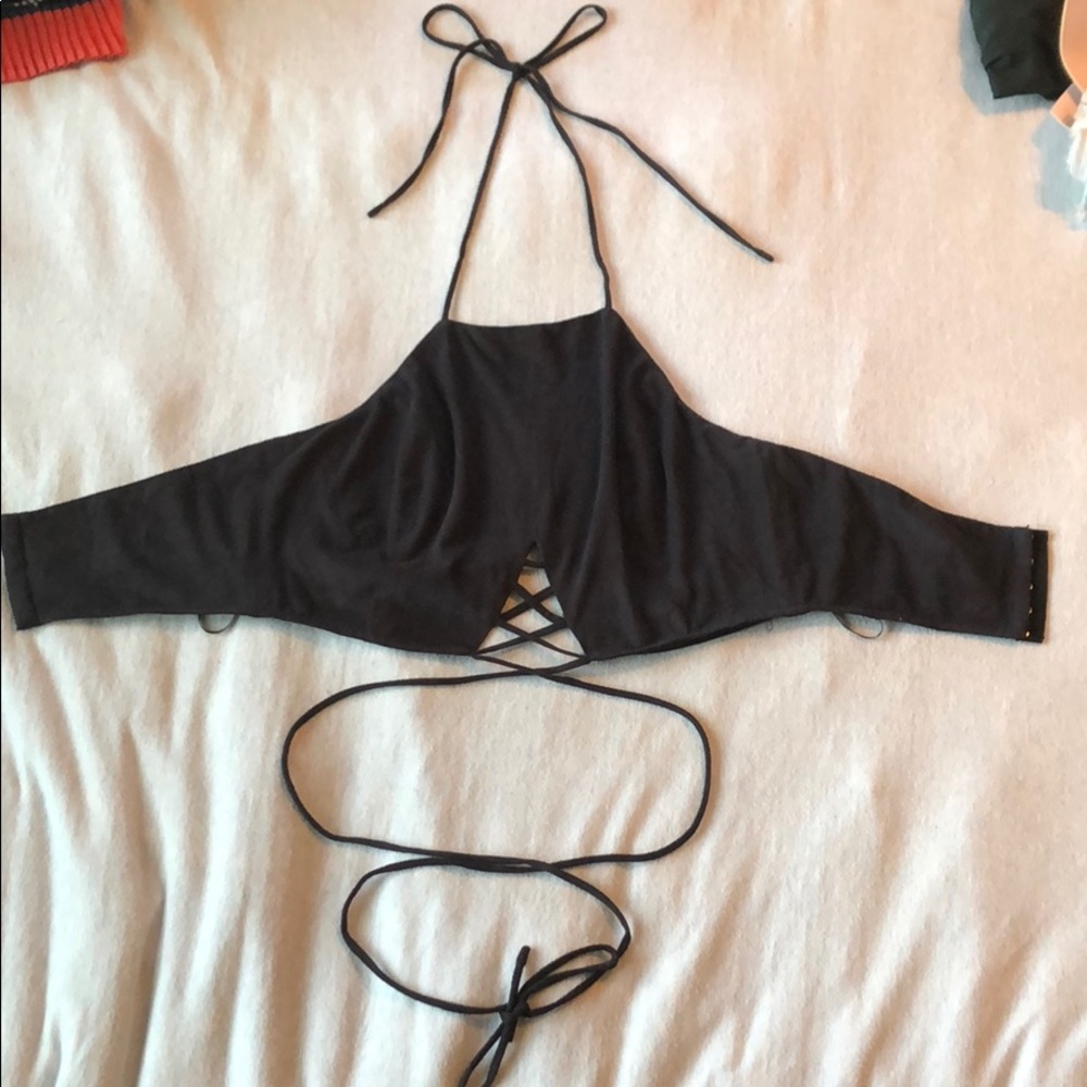 Open back, crop top shirt.